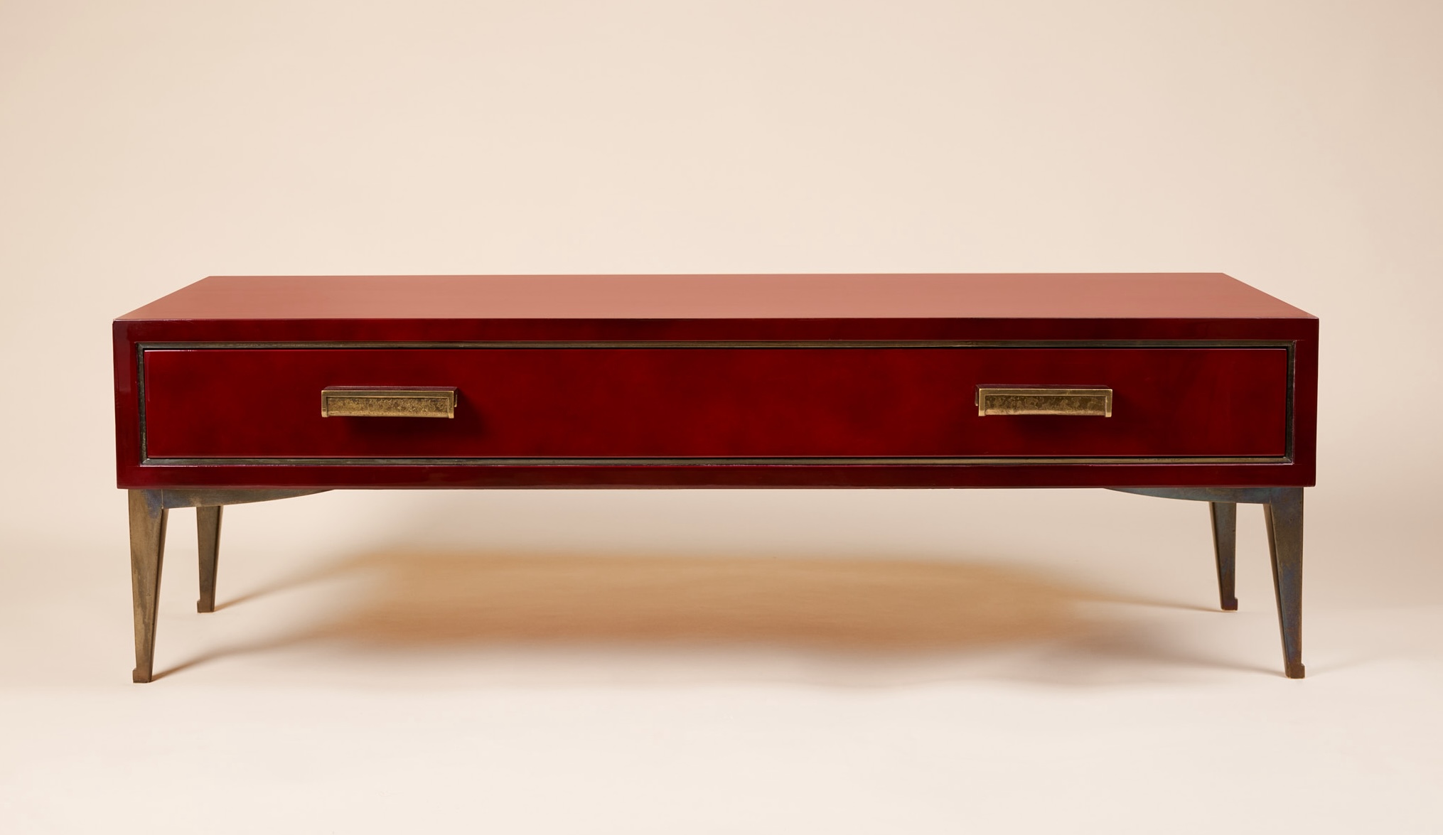 Low side table with drawer in lacquer by Jacques Quinet, c.1965, with bronze handles and feet.