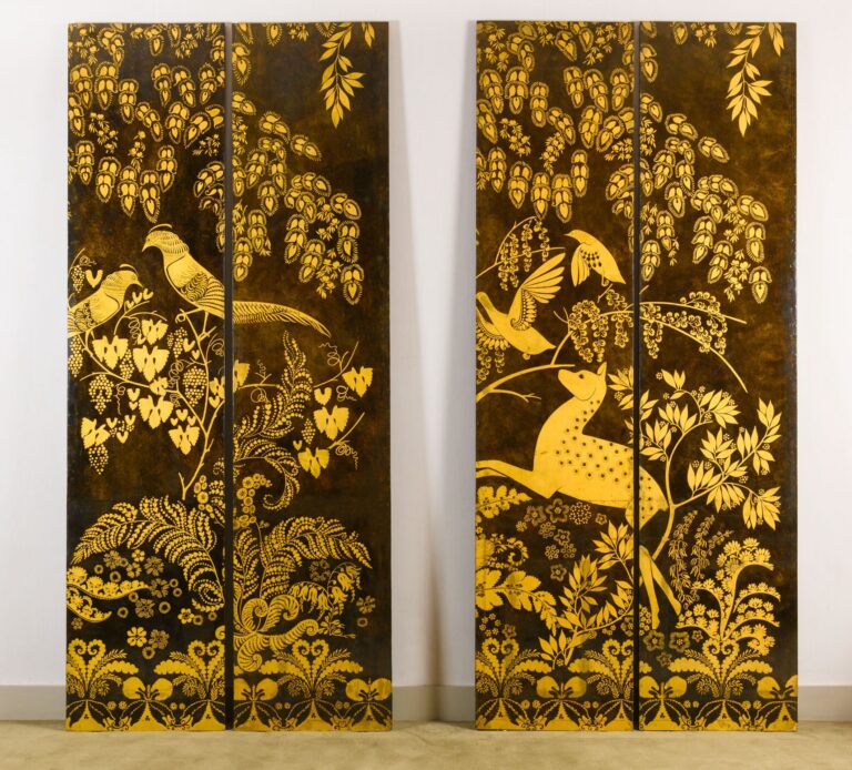 Two pairs of decorative​ lacquered panels by Armand-Albert Rateau, c. 1925. Gold leaf decor on dark background wooden panels.​