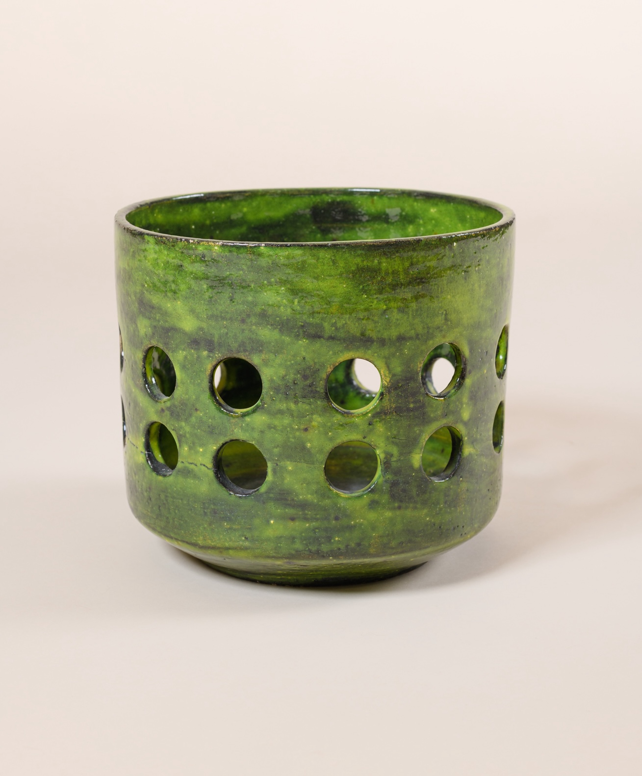 ​ “Brasero” planter by Mado Jolain, c. 1960. Earthenware green-yellow glazed ceramic.