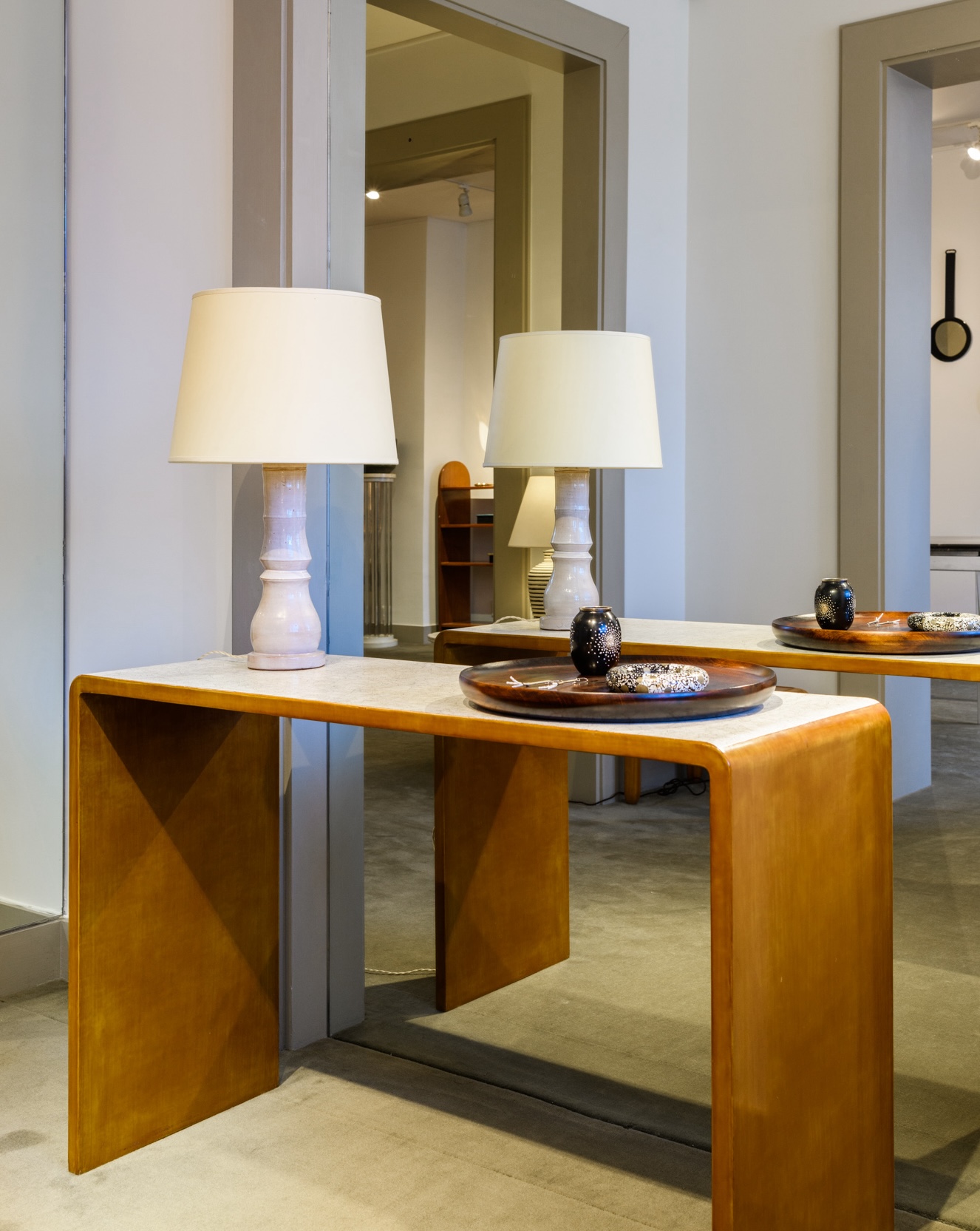 Lacquered and eggshell console and vase by Jean Dunand, lacquered tray and jewelry by Salomé Lippuner, ceramic lamp by Gio Colucci, c.1940 .