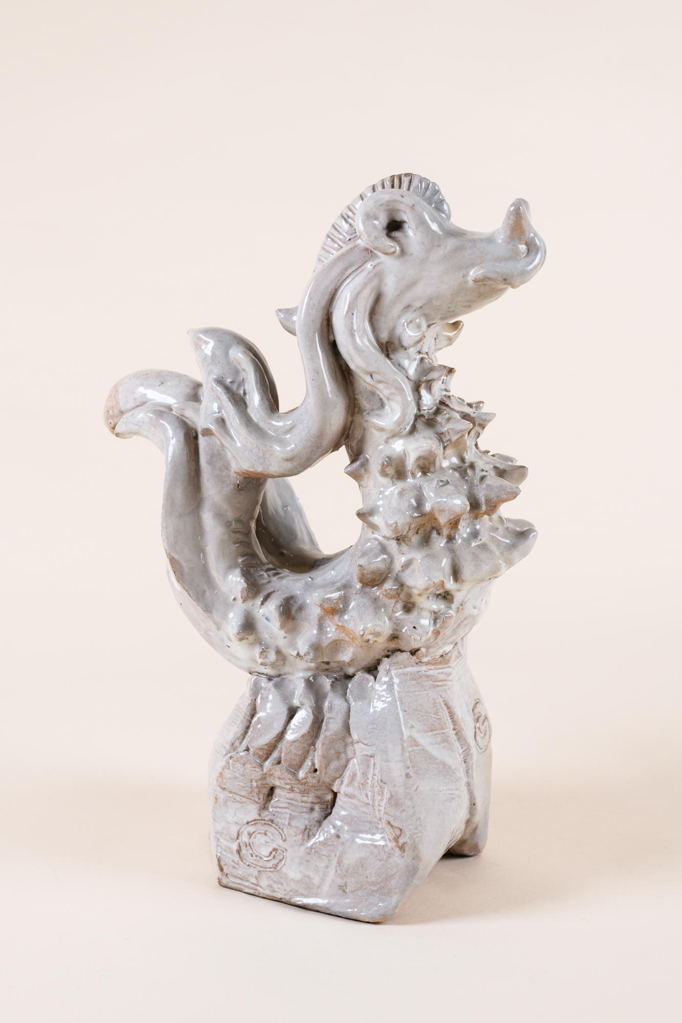 Dragon centrepiece in off-white enamelled terracotta​ by Gio Colucci, c.1940.