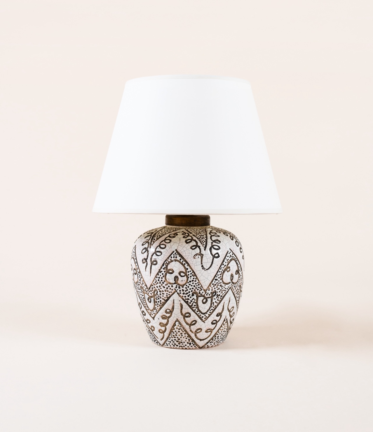 Lamp by Primavera c.1930. Ceramic and white enamel decor​.