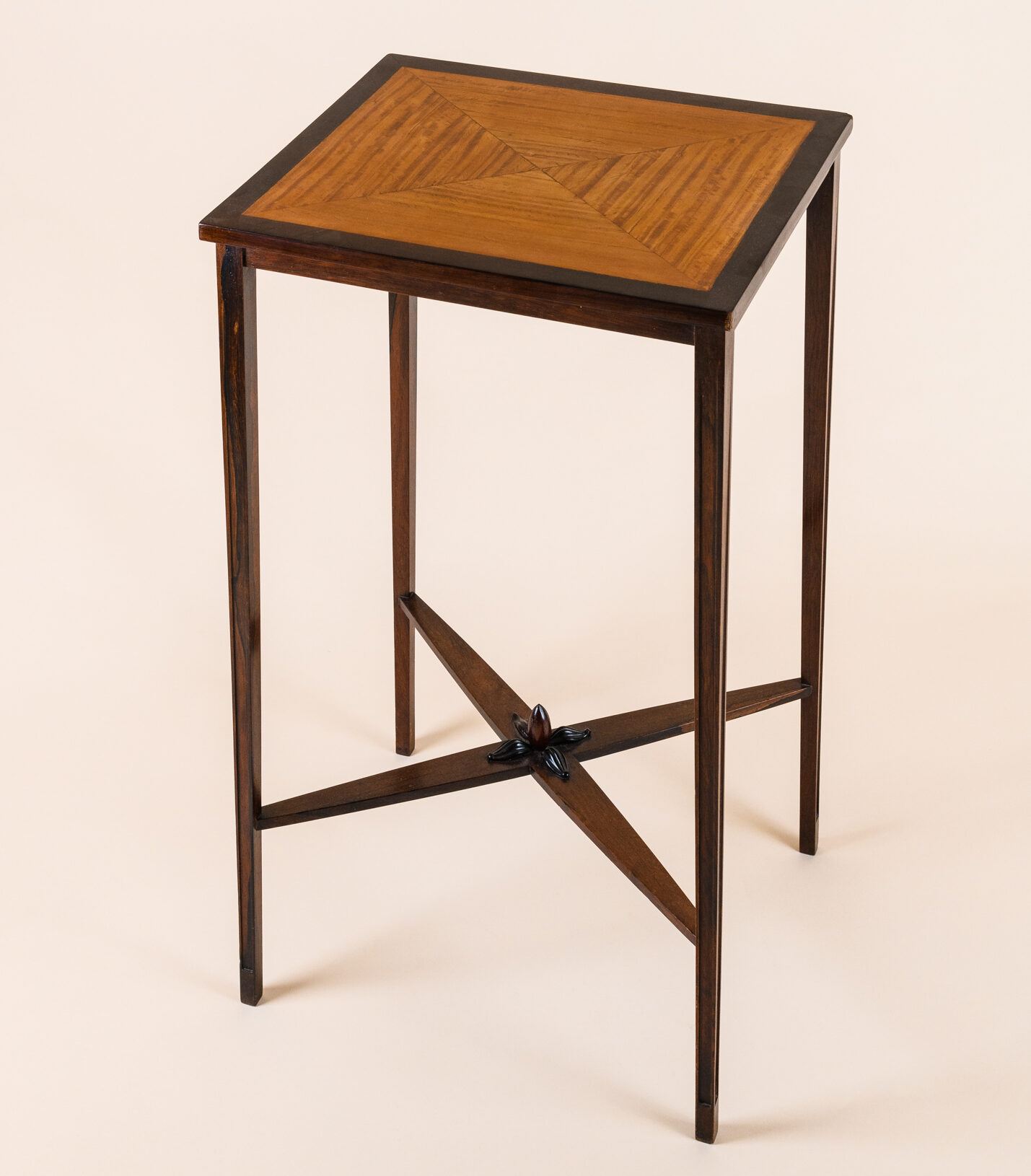 Rectangular side table, by André Fréchet c.1930, lemontree veneer and solid rosewood feet.​