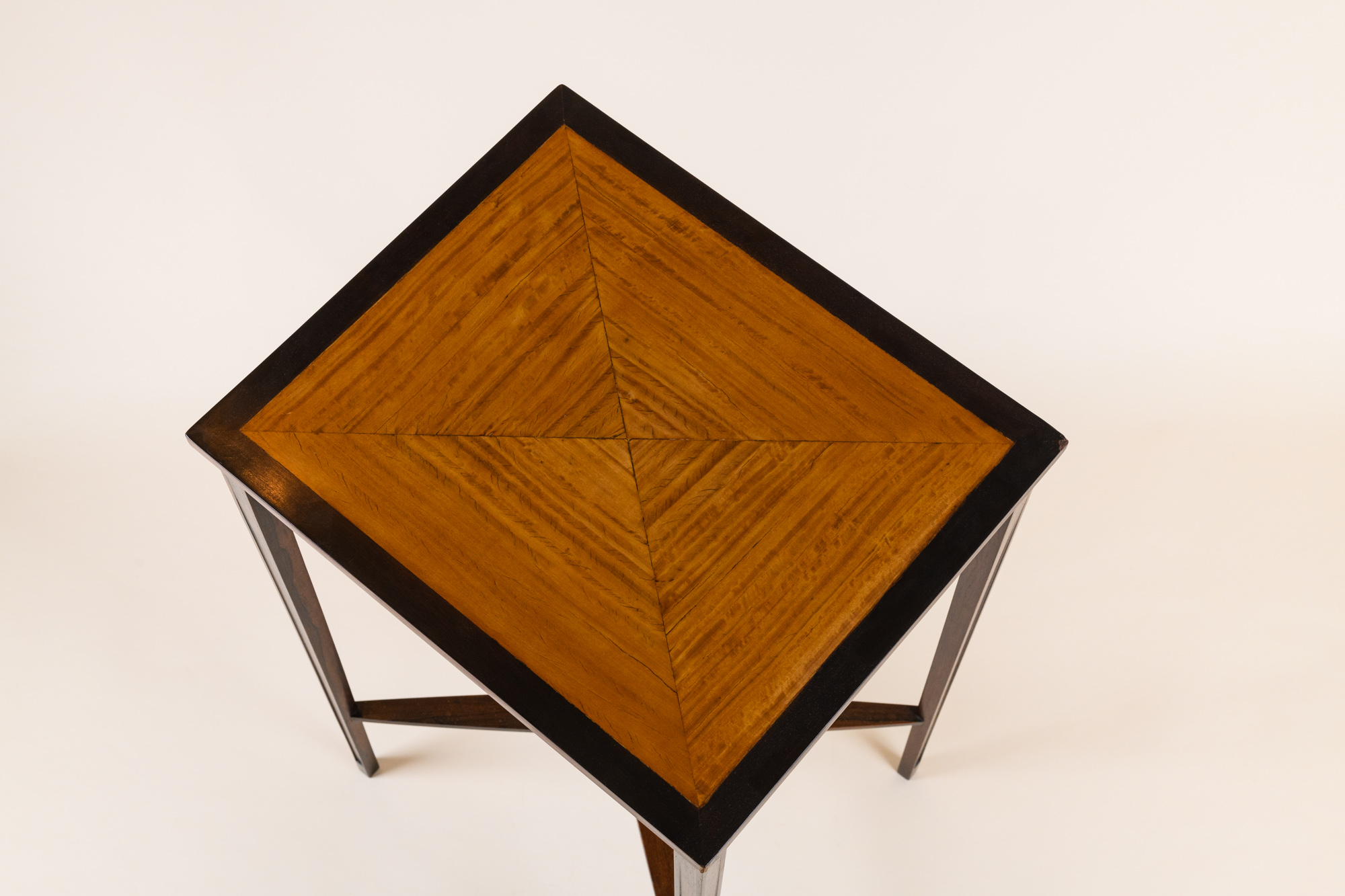 Rectangular side table, by André Fréchet c.1930, lemontree veneer and solid rosewood feet.​