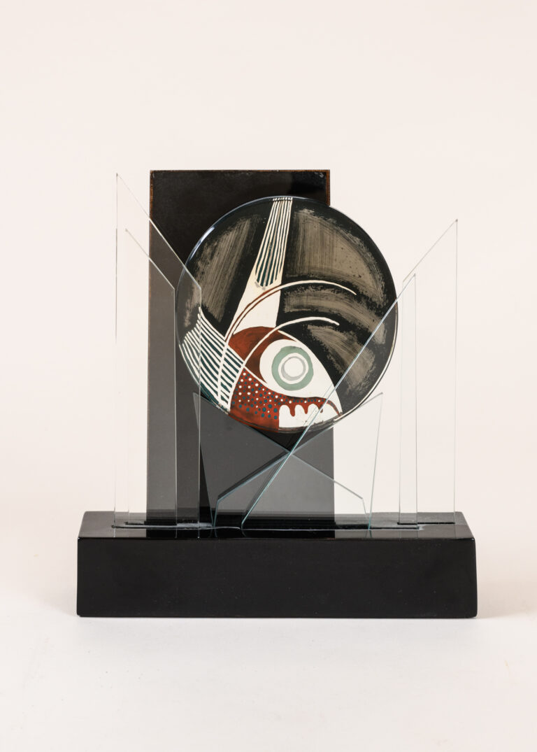 “Poisson pris”, reversed painted glass sculpture with mirror, glass on lacquered base c, 1929 by Etienne Cournault.