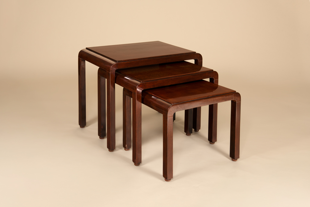 Three nesting tables enamelled by katsu Hamanaka c.1925.
