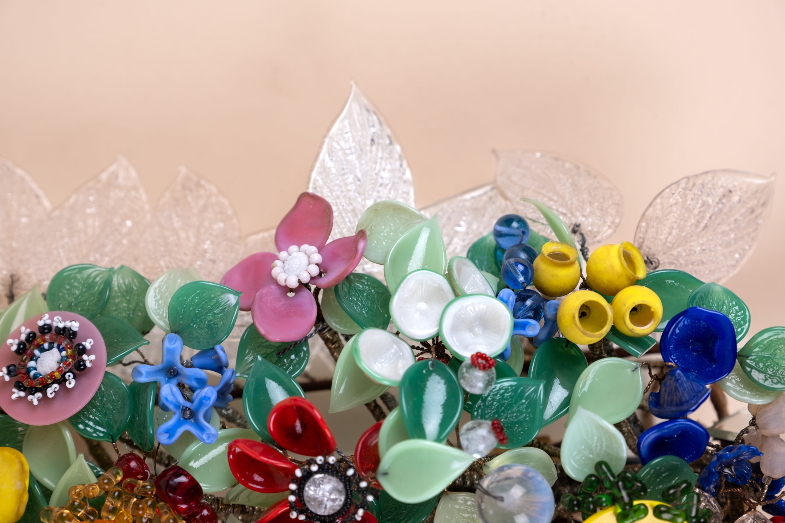 Coloured glass flowers bunch sconces by Marie Chauvel, c.1940, spun glass polychrome leaves and petals.