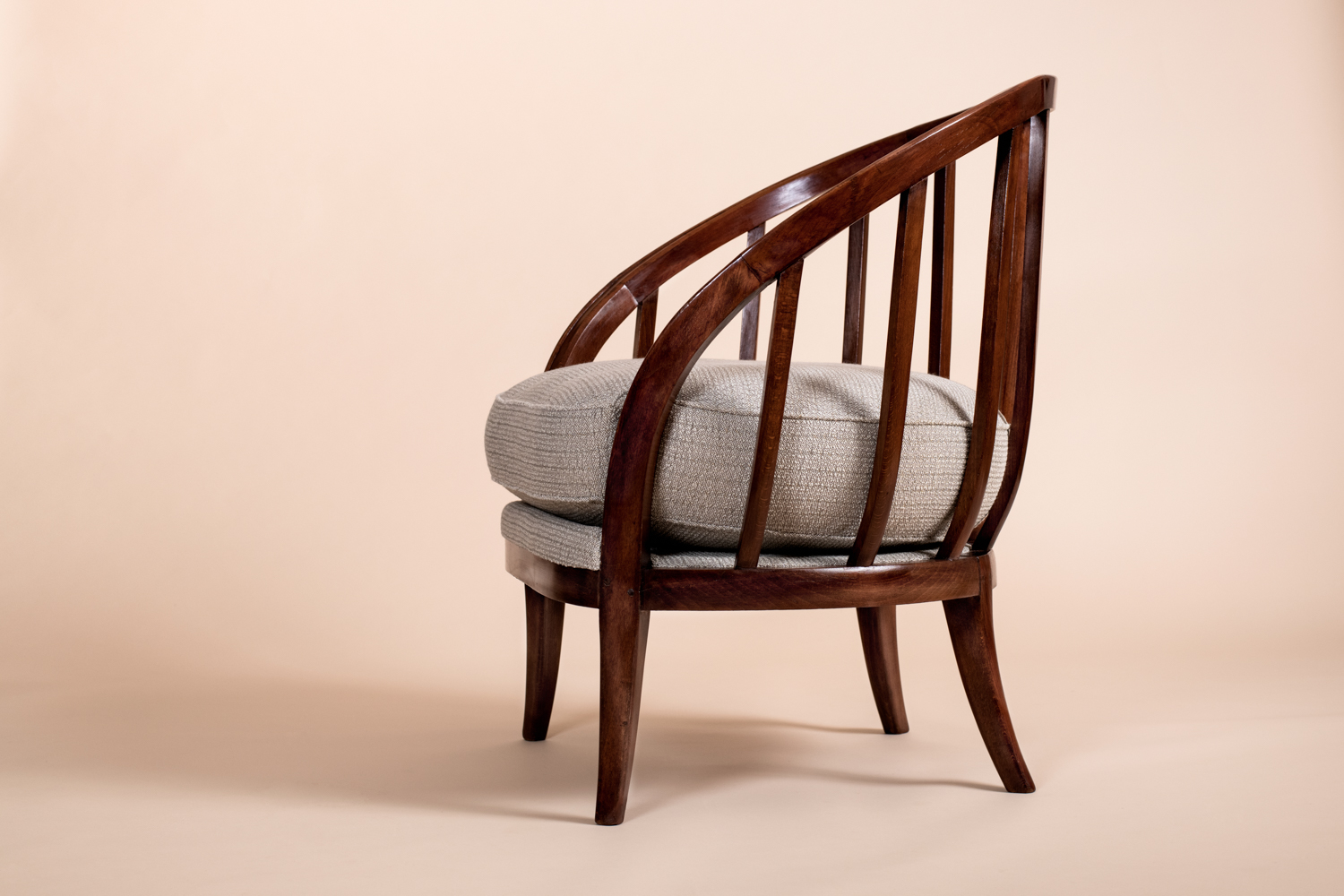 “Basket Armchair” ​ by André Groult, c. 1920 in African mahogany​.