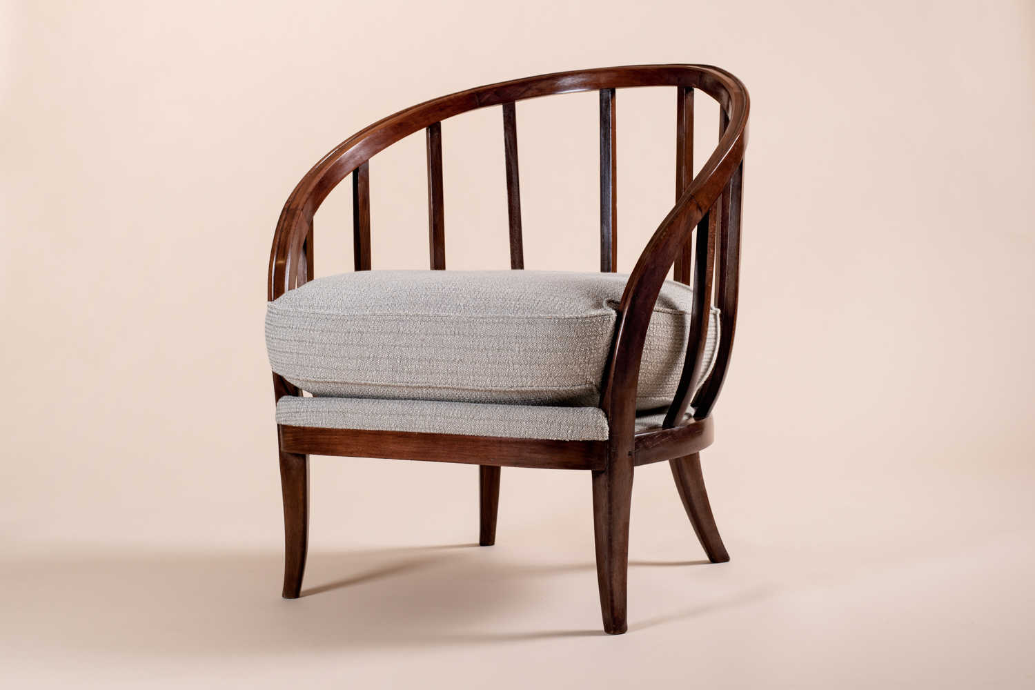 “Basket Armchair” ​ by André Groult, c. 1920 in African mahogany​.
