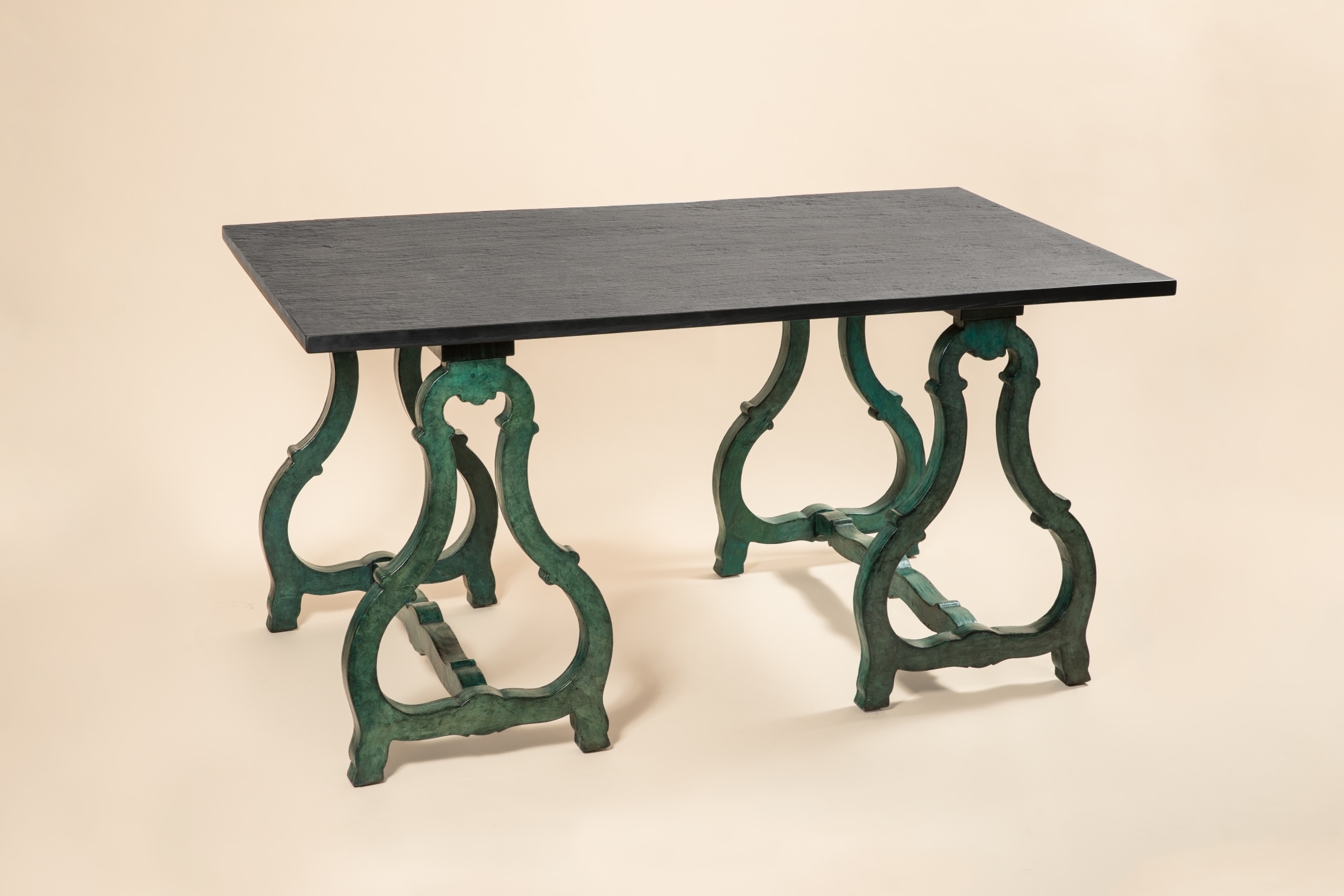Pair of wood lined with green tinted parchment trestles by Serge Roche c. 1940.