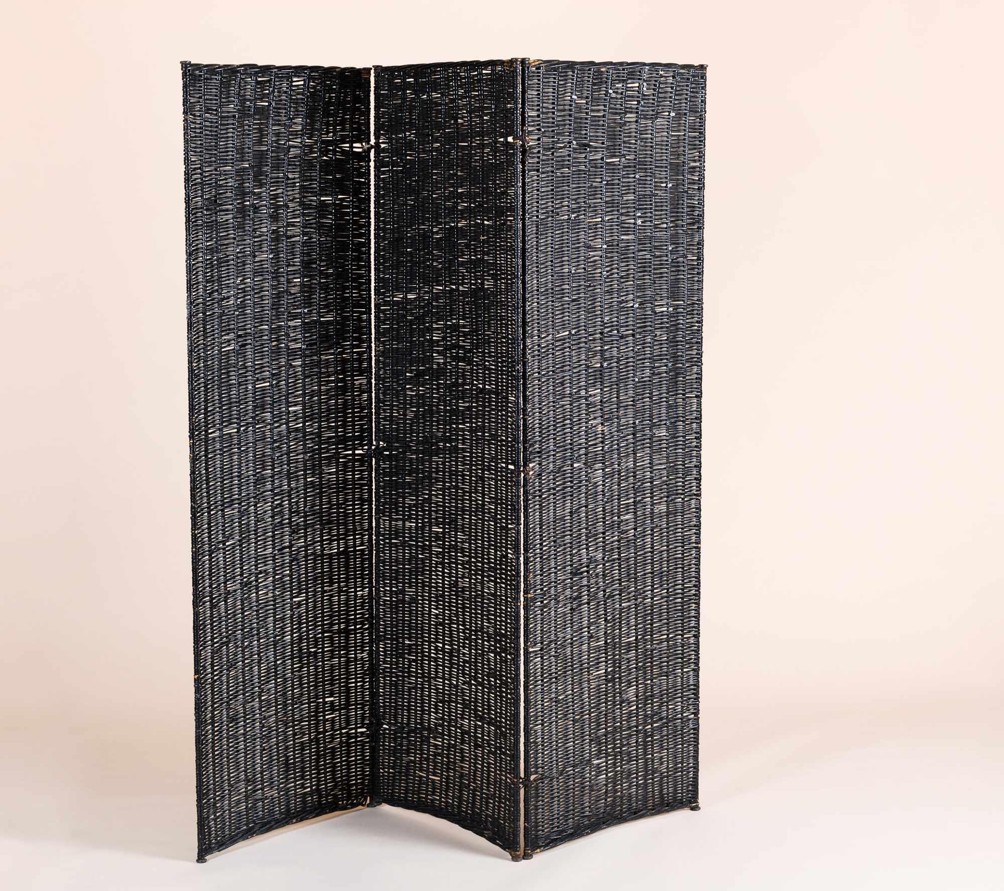 Black painted wicker screen by Pierre Chareau c. 1925.